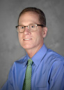 John S Schuster, MD