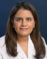 Ami B Raval, MD