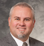 Dobie L Giles, MD