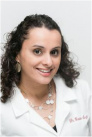 Gunita Singh, DDS