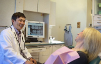 Dr.Kim in one of multiple operatories equipt with the latest modern technology. 1