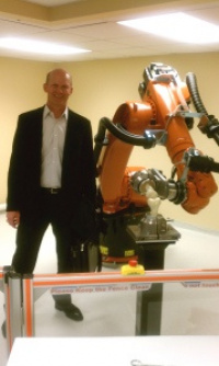 Dr. LaPrade and his KUKA KR 60-3 robot  2