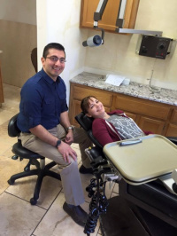 Dr. Pouya Momtaz with his dental implants patient at Aces Dental Flagstaff 1