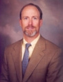 Dr. Lester E. Robertson, MD