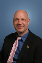 Dr. Paul E Lyons, MD