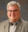 Dr. Charles E. Riggs, MD
