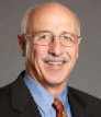 Charles E Rhoades, MD