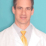 Dr. Travis Holcombe, MD