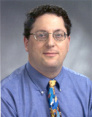 Dr. Adam E. Flanders, MD