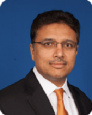 Dr. Adil K. Warsy, MD
