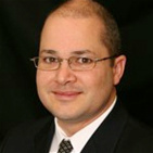 Carlos R Vassaux, MD