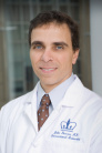 Dr. John M Poneros, MD