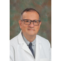 Dr. Carlos A. Mora, MD
