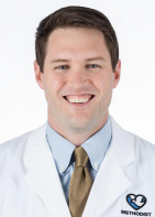 Andrew M Holcomb, MD
