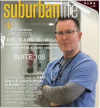 Dr. Hiller on the cover of Suburban Life Magazine 0